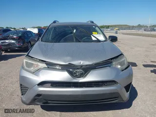 2018 Toyota RAV4 LE with VIN JTMZFREVXJJ196183, listed as a IAAI auction lot 41776107 with 82,713 mi miles. Bid and sale history available at carsss.com. Image 13.