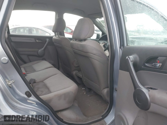 2009 Honda CR-V LX with VIN 5J6RE48339L016522, listed as a IAAI auction lot 40783609 with 209,891 mi miles. Bid and sale history available at carsss.com. Image 8.