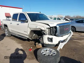 2014 GMC Sierra 1500 Denali z VIN 3GTU2WEJ5EG461665, wystawiony jako IAAI lot #41101981 z przebiegiem 202 850 mil mil oraz . Historia ofert i sprzedaży dostępna na DreamBid. Obrazek 1.
