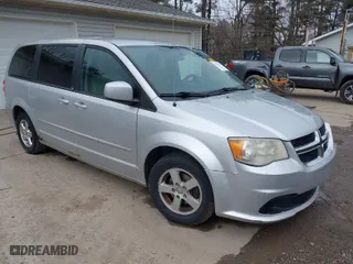 2012 Dodge Grand Caravan SXT with VIN 2C4RDGCG7CR309827, listed as a IAAI auction lot 41722314 with 156,585 mi miles. Bid and sale history available at carsss.com. Image 1.