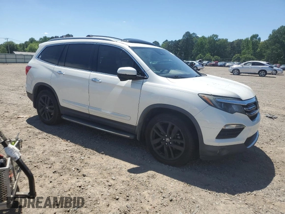 2017 Honda Pilot Touring with VIN 5FNYF6H97HB102965, listed as a Copart auction lot 53901625 with 138,346 mi miles and Salvage Title. Bid and sale history available at DreamBid. Image 4.