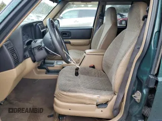 2000 Jeep Cherokee with VIN 1J4FF48S3YL149593, listed as a Copart auction lot 52489045 with 290,231 mi miles and Salvage title. Bid and sale history available at DreamBid. Image 7.