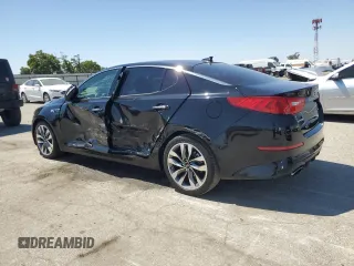 2015 Kia Optima SX Turbo with VIN 5XXGR4A67FG504129, listed as a Copart auction lot 60459525 with 62,091 mi miles and Salvage title. Bid and sale history available at DreamBid. Image 2.