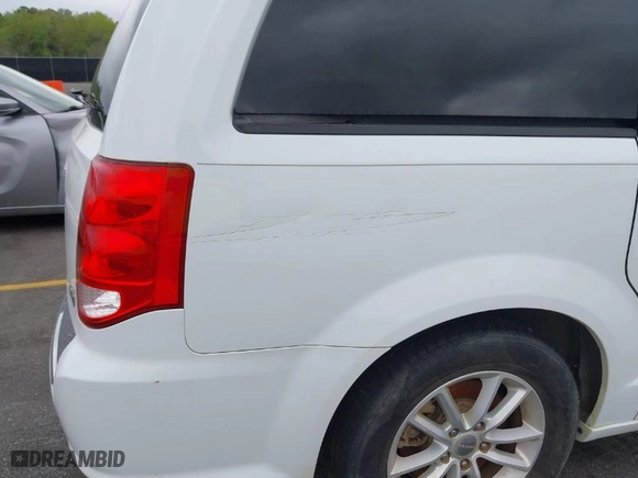 2014 Dodge Grand Caravan SXT with VIN 2C4RDGCG0ER390849, listed as a IAAI auction lot 41957368 with 98,044 mi miles. Bid and sale history available at carsss.com. Image 13.