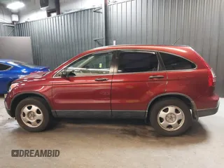 2009 Honda CR-V LX with VIN JHLRE48339C018957, listed as a IAAI auction lot 41952951 with 76,502 mi miles. Bid and sale history available at carsss.com. Image 14.