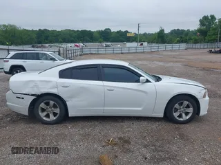 2014 Dodge Charger SE with VIN 2C3CDXBG5EH277920, listed as a IAAI auction lot 42109354 with 146,615 mi miles and . Bid and sale history available at carsss.com. Image 14.