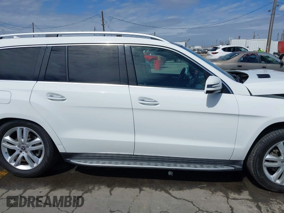 2018 Mercedes-Benz GLS 450 with VIN 4JGDF6EE9JB049030, listed as a IAAI auction lot 41804243 with 60,985 mi miles and . Bid and sale history available at DreamBid. Image 14.