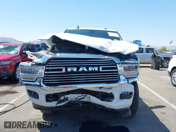 2023 Ram 2500 Laramie with VIN 3C6UR5FL2PG559276, listed as a IAAI auction lot 42281324 with 23,526 mi miles and . Bid and sale history available at DreamBid. Image 6.