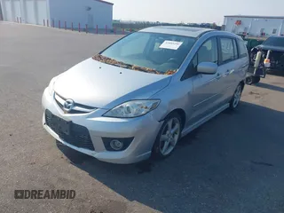 2008 Mazda 5 Grand Touring z VIN JM1CR29L580320258, wystawiony jako IAAI lot #42403256 z przebiegiem 182 914 mil mil oraz . Historia ofert i sprzedaży dostępna na DreamBid. Obrazek 6.
