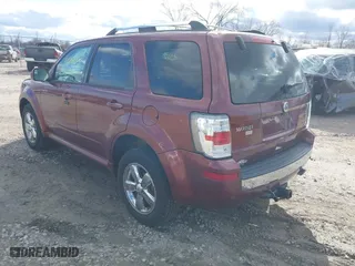 2010 Mercury Mariner Premier with VIN 4M2CN9HG4AKJ24454, listed as a IAAI auction lot 42041460 with 119,944 mi miles. Bid and sale history available at carsss.com. Image 3.