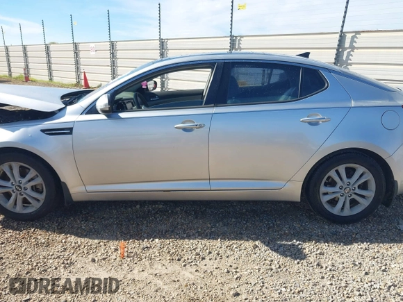 2011 Kia Optima EX with VIN KNAGN4A62B5147448, listed as a IAAI auction lot 41823132 with 219,412 mi miles and . Bid and sale history available at carsss.com. Image 13.