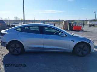 2018 Tesla Model 3 Long Range Battery with VIN 5YJ3E1EB9JF065057, listed as a IAAI auction lot 41863903 with 54,584 mi miles and . Bid and sale history available at DreamBid. Image 13.