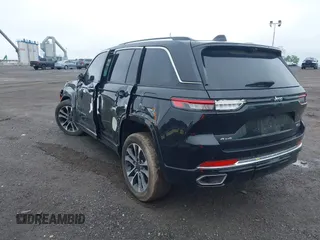 2023 Jeep Grand Cherokee Overland with VIN 1C4RJHDG2PC516797, listed as a IAAI auction lot 42026063 with 25,808 mi miles and . Bid and sale history available at DreamBid. Image 3.