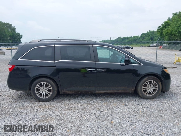 2012 Honda Odyssey EX-L with VIN 5FNRL5H66CB095996, listed as a IAAI auction lot 42446499 with 198,016 mi miles and . Bid and sale history available at DreamBid. Image 13.