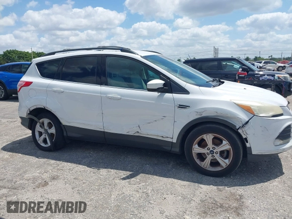 2013 Ford Escape SE with VIN 1FMCU0GX0DUC79223, listed as a IAAI auction lot 42077240 with 158,141 mi miles and . Bid and sale history available at DreamBid. Image 13.