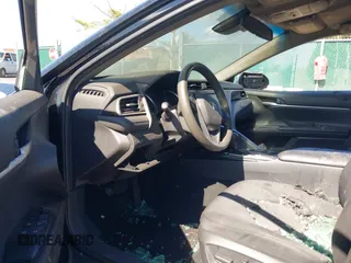 2018 Toyota Camry LE z VIN 4T1B11HK4JU067885, wystawiony jako IAAI lot #41885909 z przebiegiem 122 020 mil mil oraz . Historia ofert i sprzedaży dostępna na DreamBid. Obrazek 5.