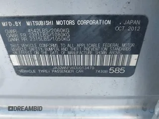 2013 Mitsubishi Lancer Evolution MR with VIN JA32W5FV6DU013470, listed as a IAAI auction lot 41544077 with 124,262 mi miles. Bid and sale history available at carsss.com. Image 9.