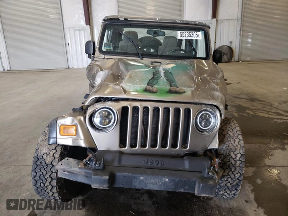 2004 Jeep Wrangler Rubicon z VIN 1J4FA69S44P784141, wystawiony jako Copart lot #55235305 z przebiegiem 125 564 mil mil oraz Szkoda całkowita • Salvage title. Historia ofert i sprzedaży dostępna na DreamBid. Obrazek 5.