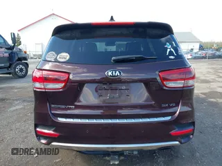 2016 Kia Sorento SX with VIN 5XYPKDA58GG002304, listed as a IAAI auction lot 41990332 with 132,025 mi miles. Bid and sale history available at carsss.com. Image 16.