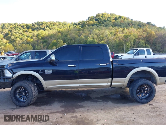 2012 Ram 2500 Laramie Longhorn with VIN 3C6UD5GLXCG236343, listed as a IAAI auction lot 40491864 with 131,677 mi miles. Bid and sale history available at carsss.com. Image 14.