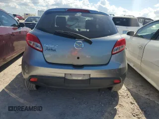 2014 Mazda 2 Sport with VIN JM1DE1KY6E0189739, listed as a Copart auction lot 76468914 with 107,164 mi miles and Salvage Title. Bid and sale history available at carsss.com. Image 6.