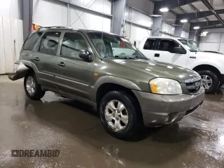 2002 Mazda Tribute LX with VIN 4F2CU08192KM29966, listed as a Copart auction lot 79458124 with 186,406 mi miles and Salvage Title. Bid and sale history available at carsss.com. Image 4.