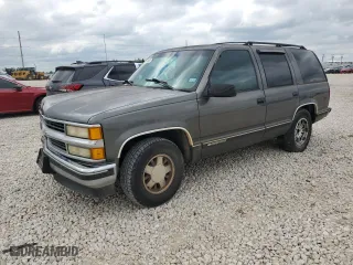 1999 Chevrolet Tahoe with VIN 1GNEC13R6XR150124, listed as a Copart auction lot 70630524 with 238,990 mi miles and Salvage Title. Bid and sale history available at carsss.com. Image 1.