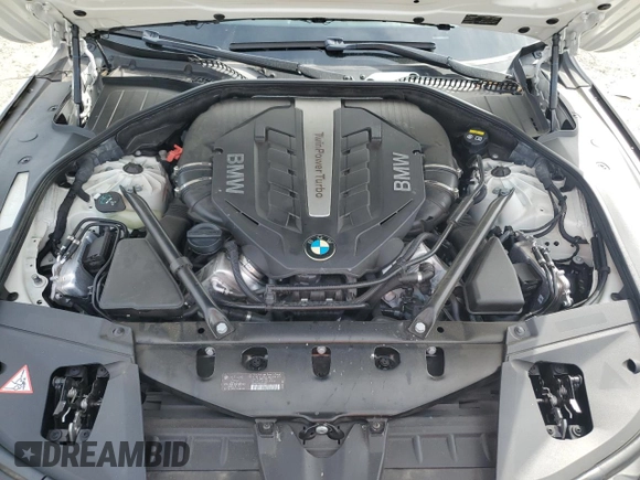 2015 BMW 7 Series 750Li z VIN WBAYE8C52FD781791, wystawiony jako Copart lot #49504935 z przebiegiem 103 171 mil mil oraz Szkoda całkowita • Salvage title. Historia ofert i sprzedaży dostępna na DreamBid. Obrazek 11.