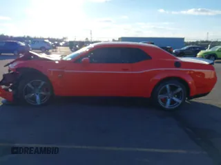 2021 Dodge Challenger R/T Scat Pack z VIN 2C3CDZFJ9MH637240, wystawiony jako IAAI lot #41411595 z przebiegiem 13 175 mil mil oraz . Historia ofert i sprzedaży dostępna na DreamBid. Obrazek 15.