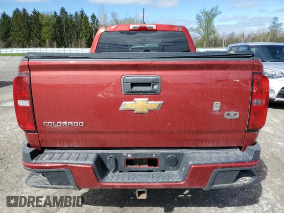 2015 Chevrolet Colorado 4WD Z71 with VIN 1GCGTCE34F1163778, listed as a Copart auction lot 54533085 with 180,319 mi miles and Salvage title. Bid and sale history available at DreamBid. Image 6.
