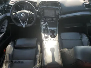 2017 Nissan Maxima SL with VIN 1N4AA6AP4HC424958, listed as a Copart auction lot 57298725 with 127,485 mi miles and Salvage title. Bid and sale history available at DreamBid. Image 8.