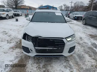 2017 Audi Q3 Premium Plus z VIN WA1JCCFS6HR008921, wystawiony jako IAAI lot #41351675 z przebiegiem 117 158 mil mil oraz . Historia ofert i sprzedaży dostępna na DreamBid. Obrazek 12.