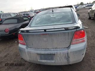 2009 Dodge Avenger SXT with VIN 1B3LC56B09N522736, listed as a IAAI auction lot 41195477 with 100,977 mi miles and . Bid and sale history available at DreamBid. Image 16.