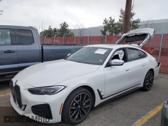 2023 BMW i4 eDrive40 z VIN WBY73AW05PFR28279, wystawiony jako IAAI lot #41262952 z przebiegiem 40 011 mil mil oraz . Historia ofert i sprzedaży dostępna na DreamBid. Obrazek 23.