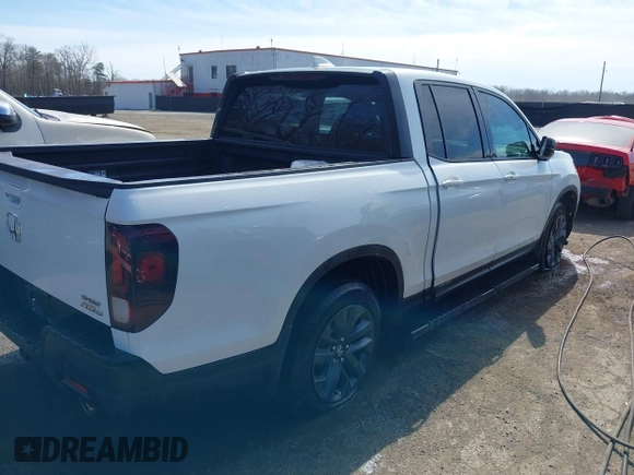 2022 Honda Ridgeline Sport z VIN 5FPYK3F12NB009135, wystawiony jako IAAI lot #41705000 z przebiegiem 50 551 mil mil oraz . Historia ofert i sprzedaży dostępna na DreamBid. Obrazek 4.