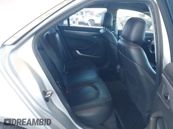 2013 Cadillac CTS Luxury with VIN 1G6DE5E52D0156666, listed as a IAAI auction lot 42058687 with 120,659 mi miles and . Bid and sale history available at DreamBid. Image 8.