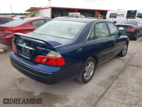 2004 Toyota Avalon XL with VIN 4T1BF28B04U352885, listed as a IAAI auction lot 42185821 with 282,186 mi miles and . Bid and sale history available at carsss.com. Image 4.