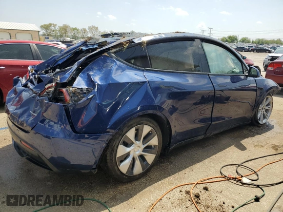 2022 Tesla Model Y Long Range z VIN 7SAYGDEE8NF447410, wystawiony jako Copart lot #54860765 z przebiegiem Nie podano mil oraz Szkody całkowita. Historia ofert i sprzedaży dostępna na DreamBid. Obrazek 3.