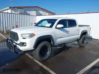 2016 Toyota Tacoma SR with VIN 5TFCZ5AN9GX020386, listed as a IAAI auction lot 41436489 with 140,512 mi miles. Bid and sale history available at carsss.com. Image 18.