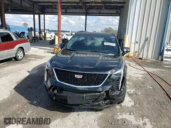 2021 Cadillac XT4 FWD Sport with VIN 1GYFZER44MF080872, listed as a Copart auction lot 86344534 with 23,865 mi miles and Salvage Title. Bid and sale history available at DreamBid. Image 14.