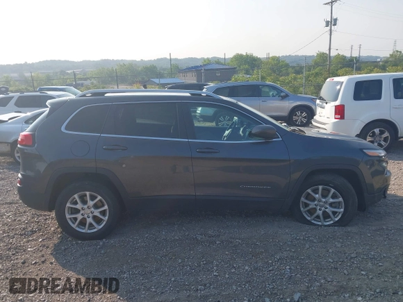 2016 Jeep Cherokee Altitude with VIN 1C4PJMCB0GW262916, listed as a IAAI auction lot 42392735 with 29,162 mi miles and . Bid and sale history available at DreamBid. Image 13.