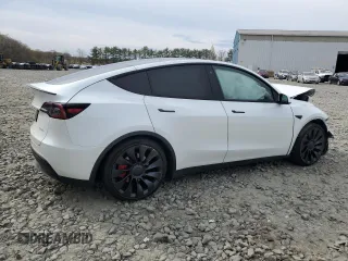 2022 Tesla Model Y Performance with VIN 7SAYGDEF9NF564566, listed as a Copart auction lot 53799715 with 38,963 mi miles and Salvage title. Bid and sale history available at DreamBid. Image 3.