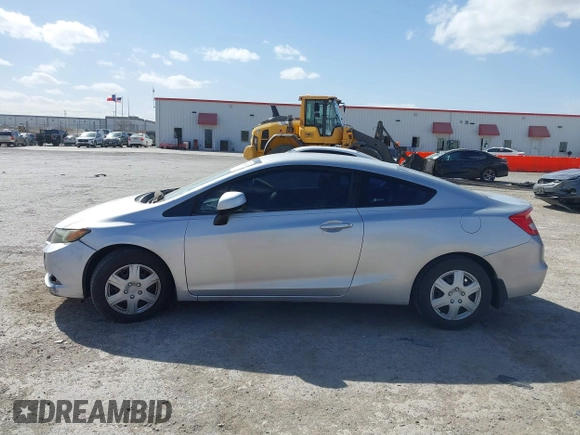 2012 Honda Civic Cpe LX with VIN 2HGFG3B52CH549698, listed as a IAAI auction lot 41818647 with 100,975 mi miles. Bid and sale history available at carsss.com. Image 14.