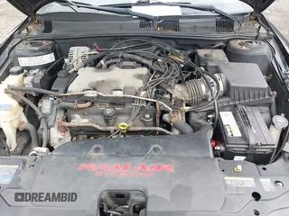 2004 Pontiac Grand Am GT with VIN 1G2NW52E84M651292, listed as a IAAI auction lot 41726143 with 137,296 mi miles. Bid and sale history available at carsss.com. Image 10.