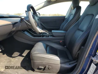 2019 Tesla Model 3 Mid Range with VIN 5YJ3E1EA6KF412837, listed as a Copart auction lot 50871195 with 39,570 mi miles and Salvage Title. Bid and sale history available at DreamBid. Image 7.