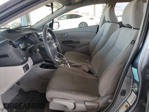 2013 Honda Insight with VIN JHMZE2H3XDS003838, listed as a Copart auction lot 52220235 with 144,729 mi miles and Salvage title. Bid and sale history available at DreamBid. Image 7.