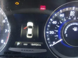 2014 Hyundai Azera Limited with VIN KMHFH4JG7EA353094, listed as a IAAI auction lot 41043222 with 184,924 mi miles and . Bid and sale history available at DreamBid. Image 7.