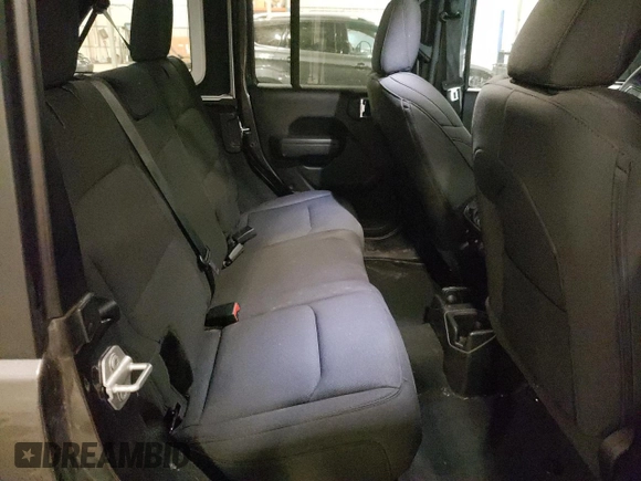 2023 Jeep Wrangler Sport Altitude with VIN 1C4HJXDG0PW679789, listed as a Copart auction lot 65991094 with 13,503 mi miles and Salvage Title. Bid and sale history available at DreamBid. Image 11.
