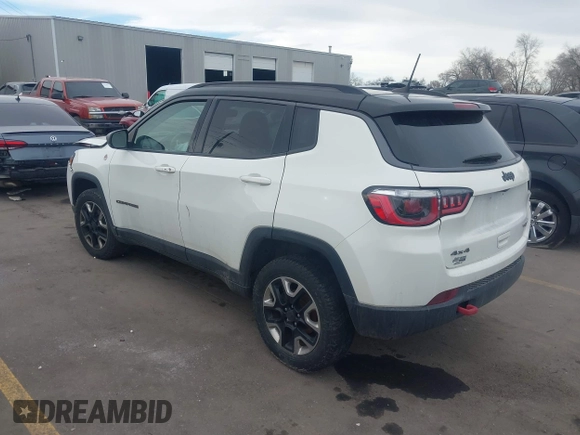 2018 Jeep Compass Trailhawk with VIN 3C4NJDDB9JT174899, listed as a IAAI auction lot 41635784 with 124,656 mi miles and . Bid and sale history available at DreamBid. Image 3.