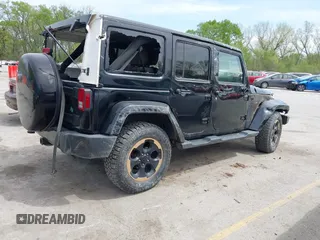 2014 Jeep Wrangler Unlimited Sahara with VIN 1C4BJWEG6EL189712, listed as a IAAI auction lot 42043053 with 108,716 mi miles. Bid and sale history available at carsss.com. Image 4.
